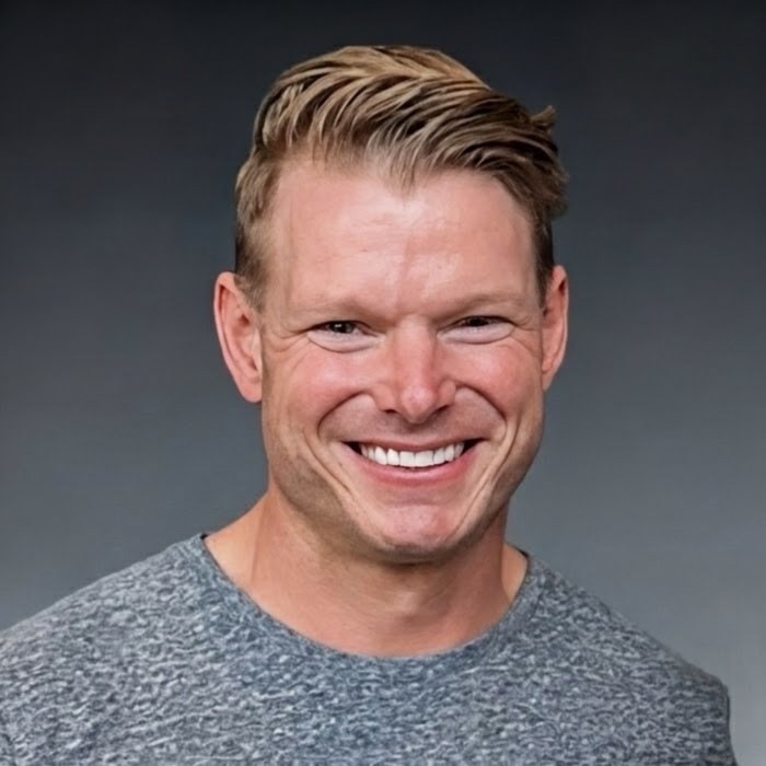 Daniel, the founder of Yui, in a studio headshot.